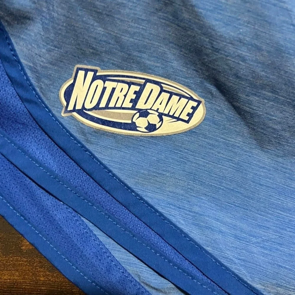 Nike Notre Dame blue shorts with white logo 317.5